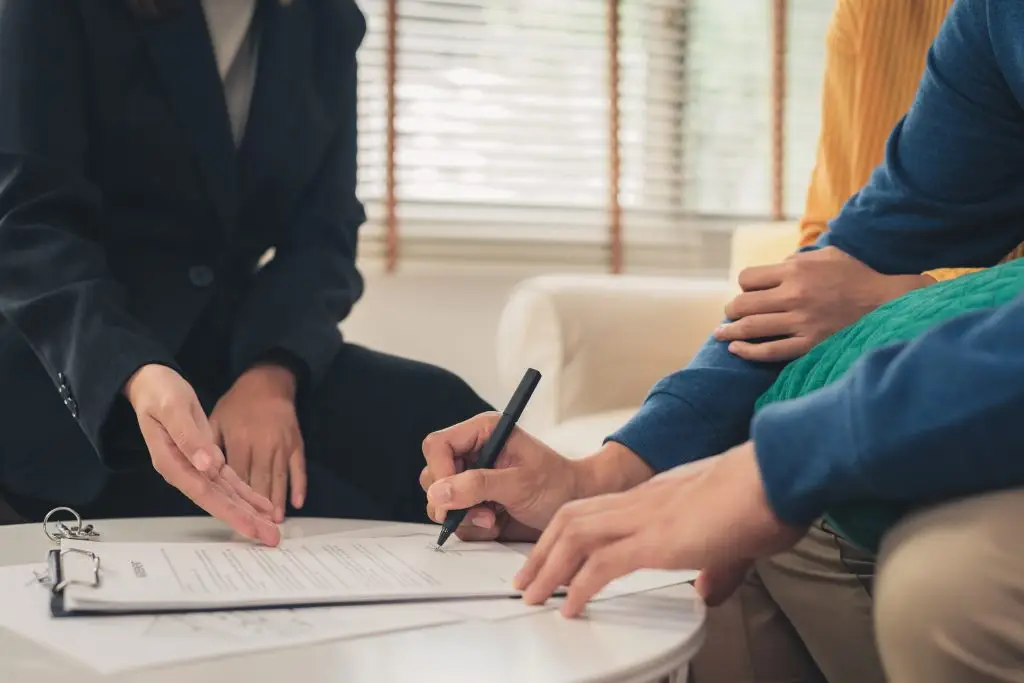Signing documents with a realtor